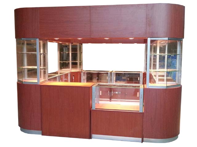 caseta-punto-de-venta-h220-300-x-300-cm-4-vitrinas-esquineras